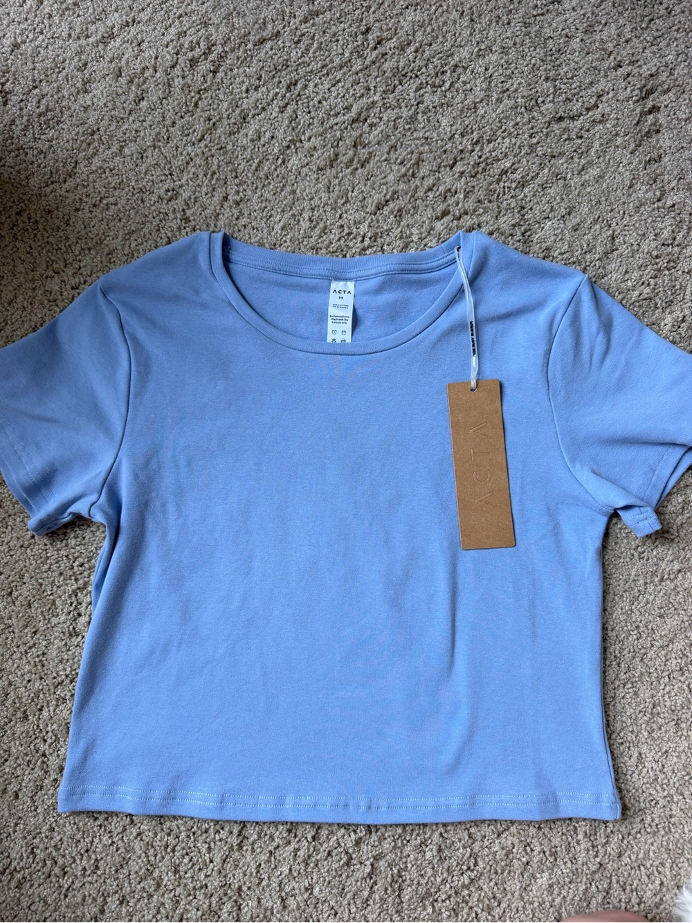 New Acta baby tee
